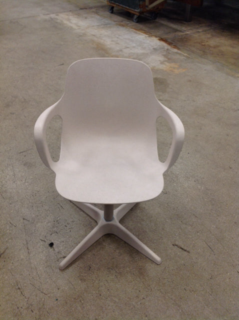 Tan Plastic Swiveling Desk Chair