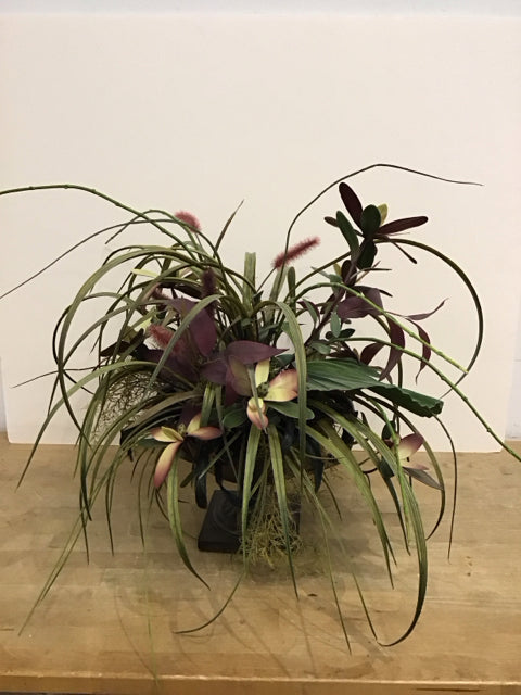 Faux Dracaena Leaves/Ferns in Resin Urn