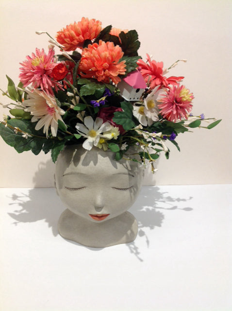Spring Flowers in Head Planter