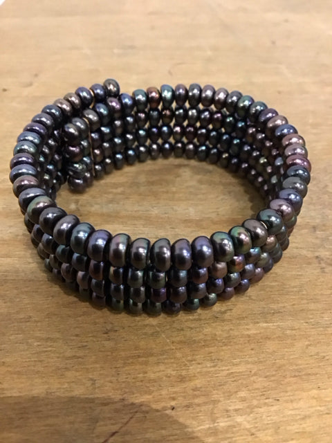 Multi Strand Peacock Colored Pearl Like Bracelet