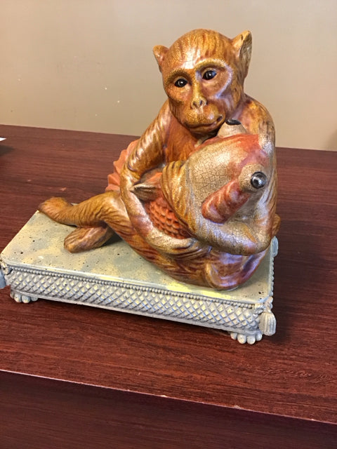 10"x11" Monkey Holding Fish Statue