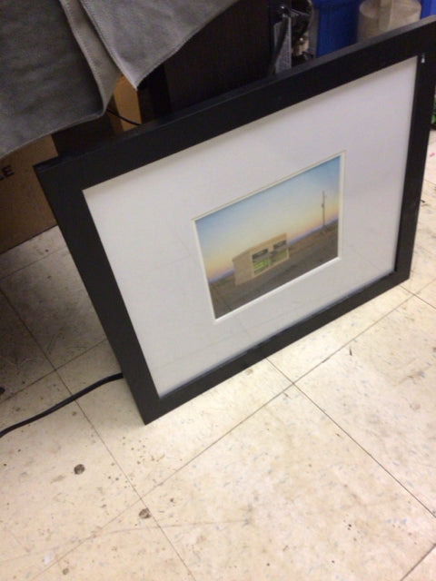 22.5" X 18.5" Black Framed Prada Building Wall Decor