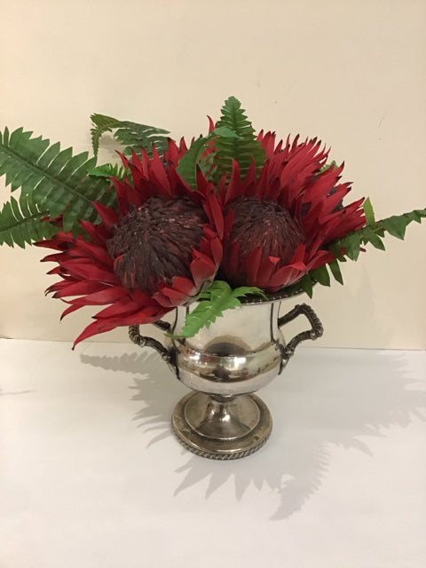 Red Protea/Ferns in Silverplate Trophy Urn