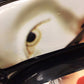AS-IS Black Lacqured Vinyl Framed Face Print Settee(Damage To Back/Trim Loose)