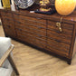 74" X 20" X 33.25" AS-IS Tommy Bahama Oceania Nine Drawer Dresser W/Mirror