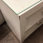 26" X 14 1/2" AS-IS Glass Top Two Drawer White Nightstand(Chip/Knick)