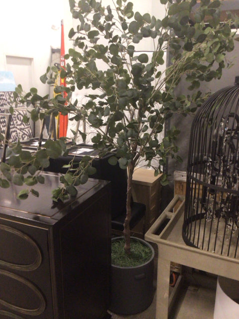 Faux Plant In Grey Planter