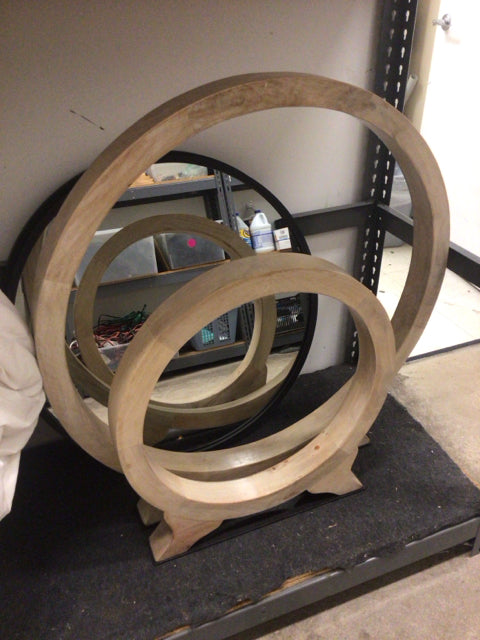 Pair Of Wood Rings On Metal Base