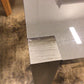 33 3/8" X 62 3/4" AS-IS Grey Lacqured Wood Leg Dining Table(One Leg Top Damage)