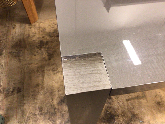 33 3/8" X 62 3/4" AS-IS Grey Lacqured Wood Leg Dining Table(One Leg Top Damage)