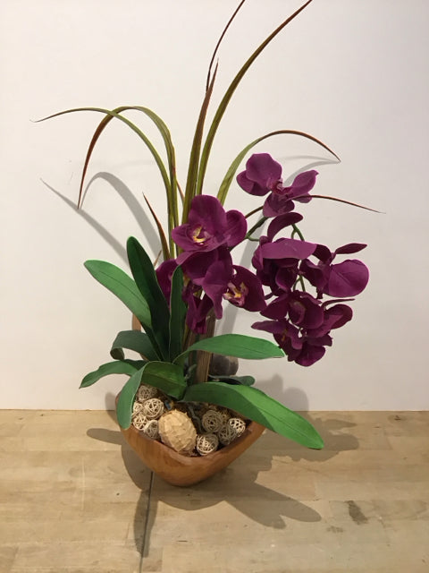 Purple Orchids in Rustic Wooden Bowl