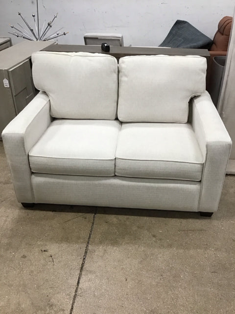 Tan Upholstered Love Seat w/Wood Feet