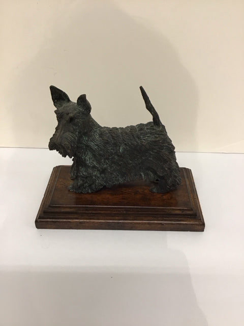 Bronze Schnauzer on Wood