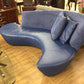 AS-IS Blue Curved Sofa W/Two Pillows (Scratches In Leather)