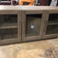 AS-IS 70" Grand Framed Weathered Wood Media Console(Doors Unleveled/Top Scratch)