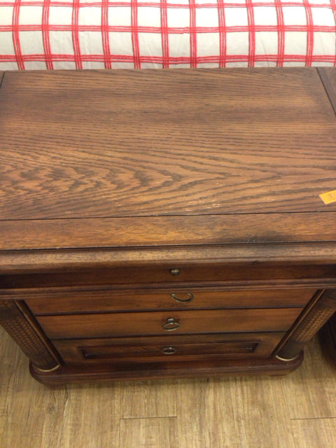 AS-IS Dark Wood Three Drawer Nightstand