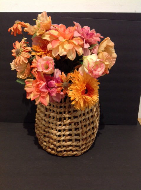 Pink/Orange Flowers in Seagrass Basket