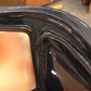 AS-IS Black Lacqured Vinyl Framed Face Print Settee(Damage To Back/Trim Loose)