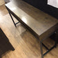 16" X 54" AS-IS Moes Furniture Wood & Metal Three Drawer Desk(Chips/Knicks)