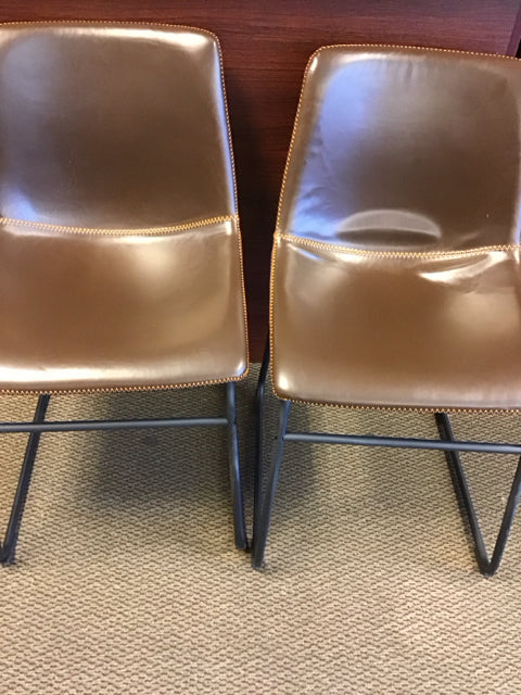 Pair Of Brown Stitched Vinyl Chairs