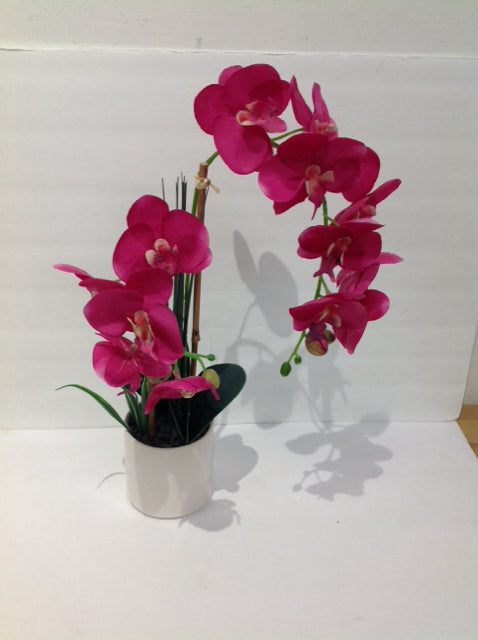 Faux Orchids in Tan Planter
