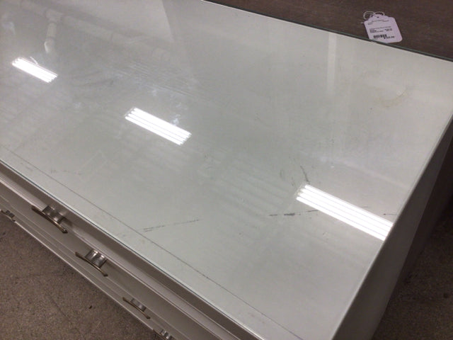 61" X 16 1/2" AS-IS HomeleganceGlass Top Zandra Eight Drawer Dresser