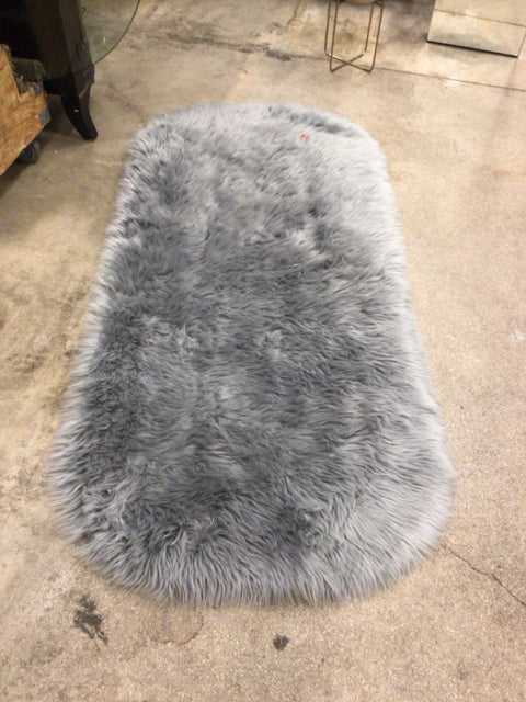 Grey Oval Fur Rug