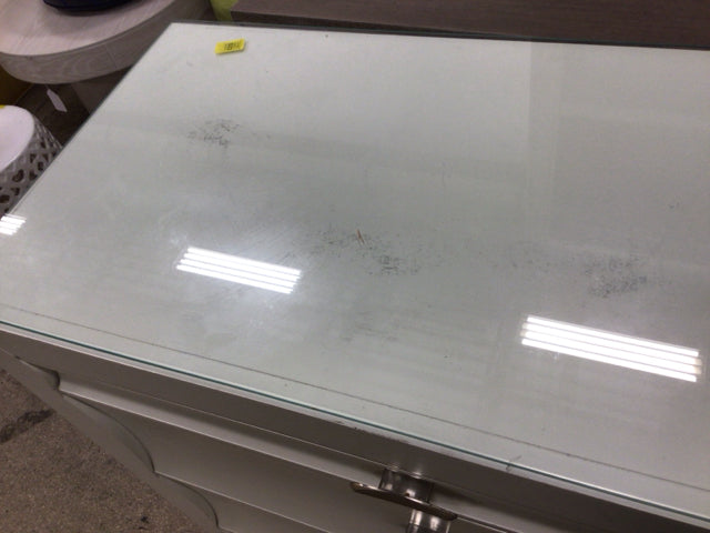 61" X 16 1/2" AS-IS HomeleganceGlass Top Zandra Eight Drawer Dresser