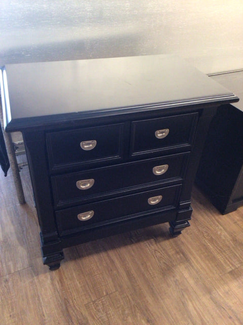 AS-IS Black Three Drawer Nightstand(Missing Chunk Back Leg)